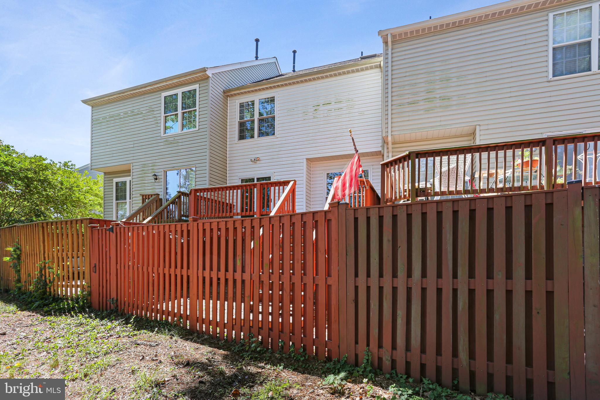 662 Howards Loop Annapolis, MD 21401 - Photo 28 of 29 a view of a house with wooden fence