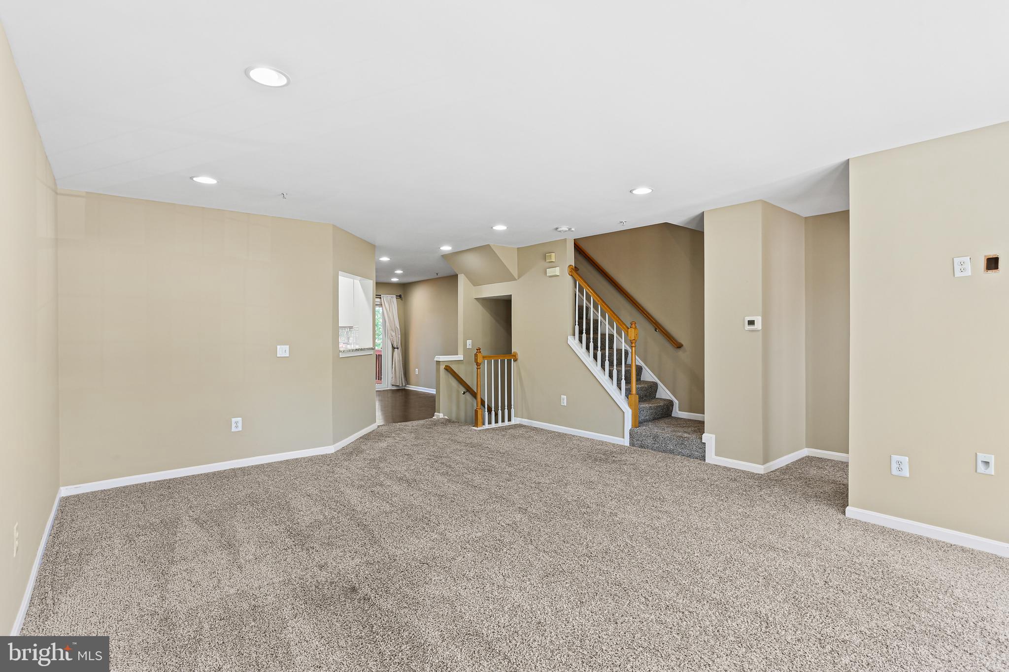 662 Howards Loop Annapolis, MD 21401 - Photo 8 of 29 a view of an empty room with stairs