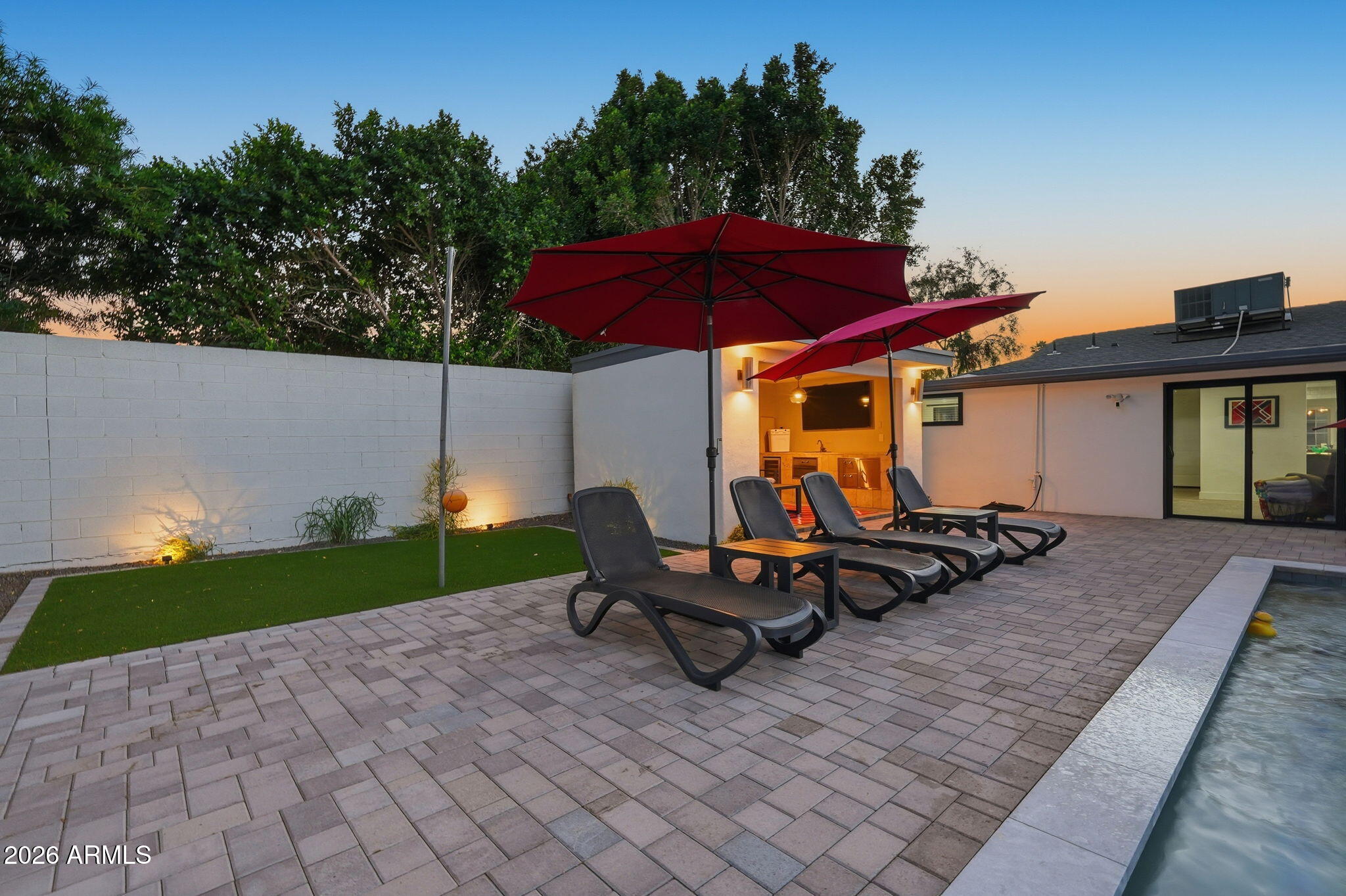 5149 North 34th Street Phoenix, AZ 85018 - Photo 68 of 70 a view of a backyard with sitting area and furniture