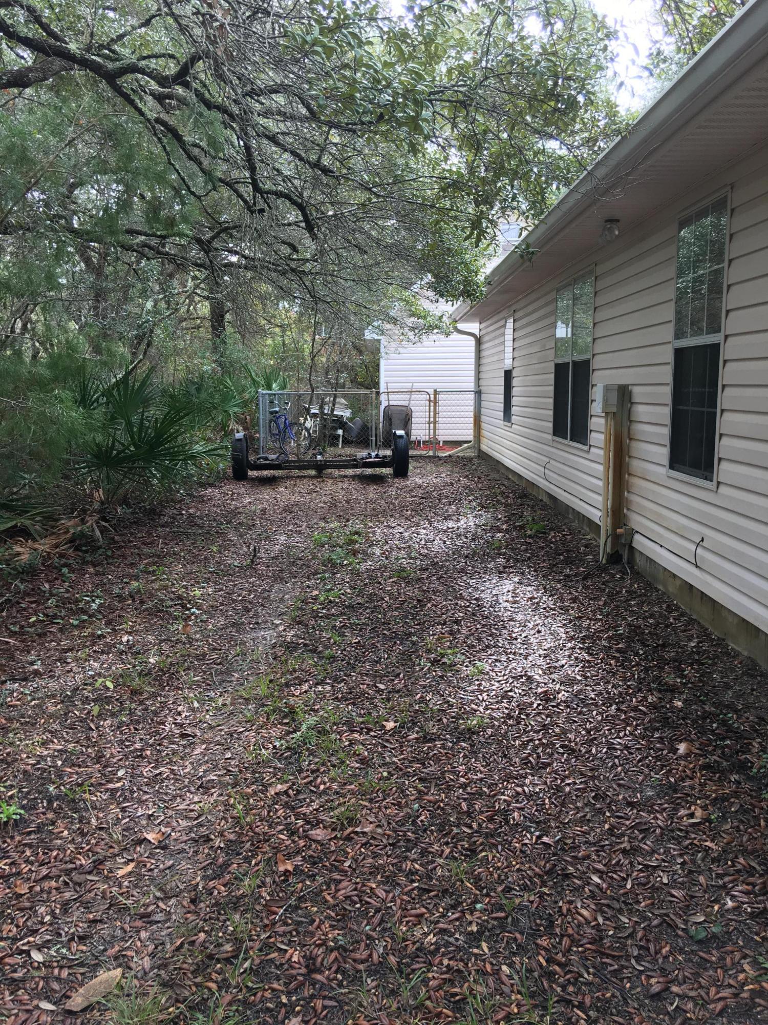 274 North Bishop Road Santa Rosa Beach, FL 32459 - Photo 14 of 17 a view of a house with a yard