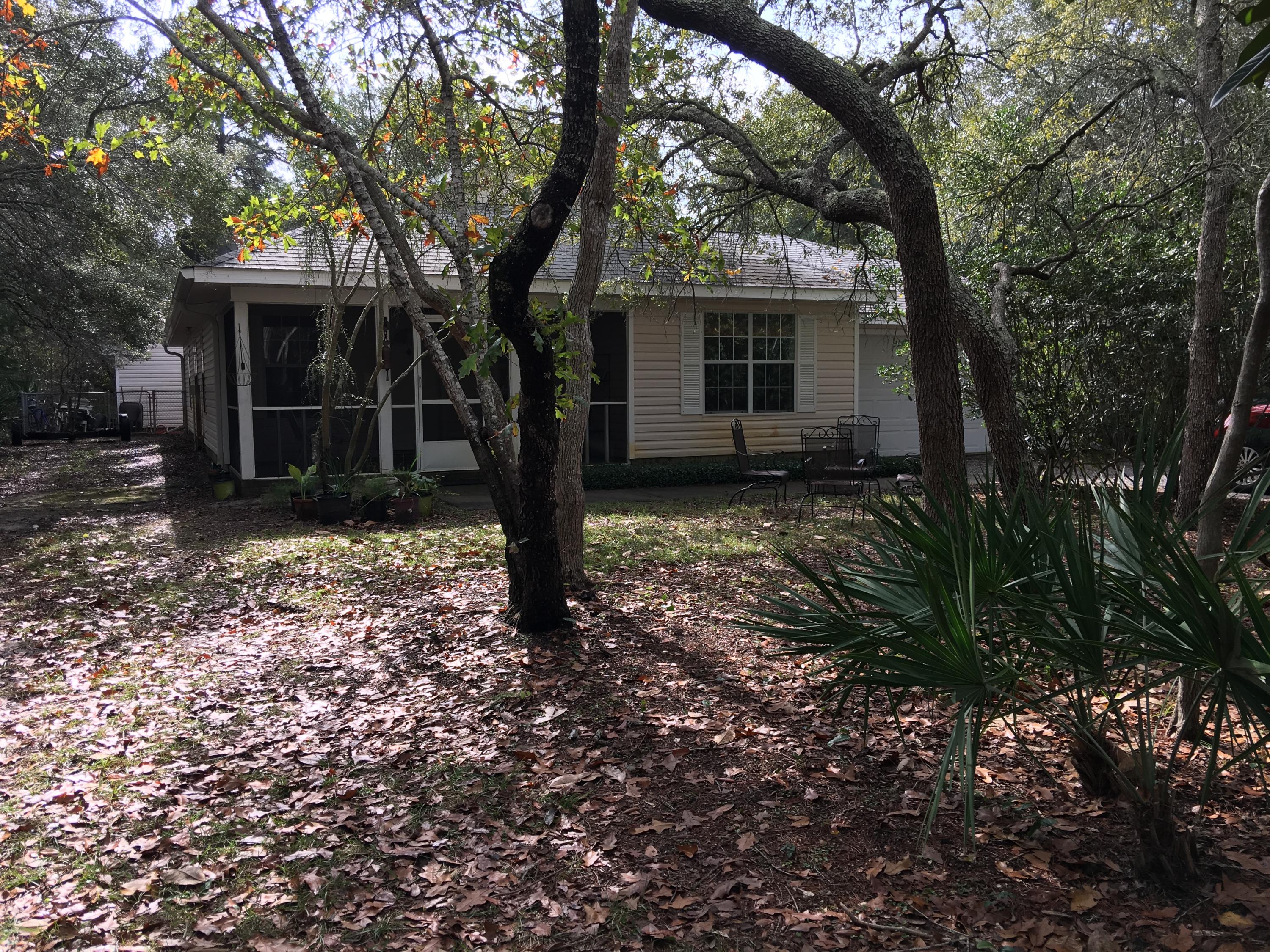 274 North Bishop Road Santa Rosa Beach, FL 32459 - Photo 17 of 17 a tree in front of a white house