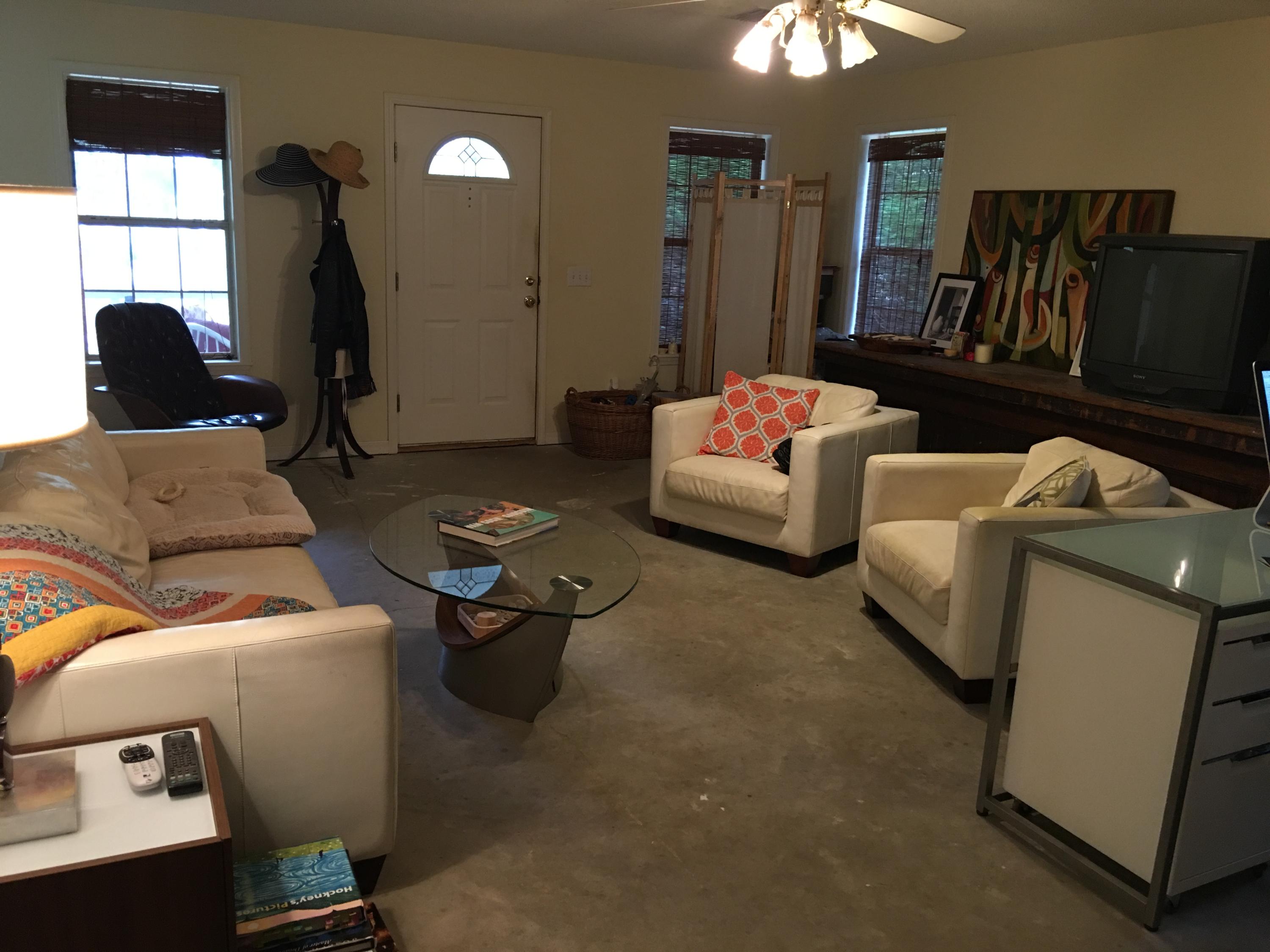 274 North Bishop Road Santa Rosa Beach, FL 32459 - Photo 3 of 17 a living room with furniture and a window
