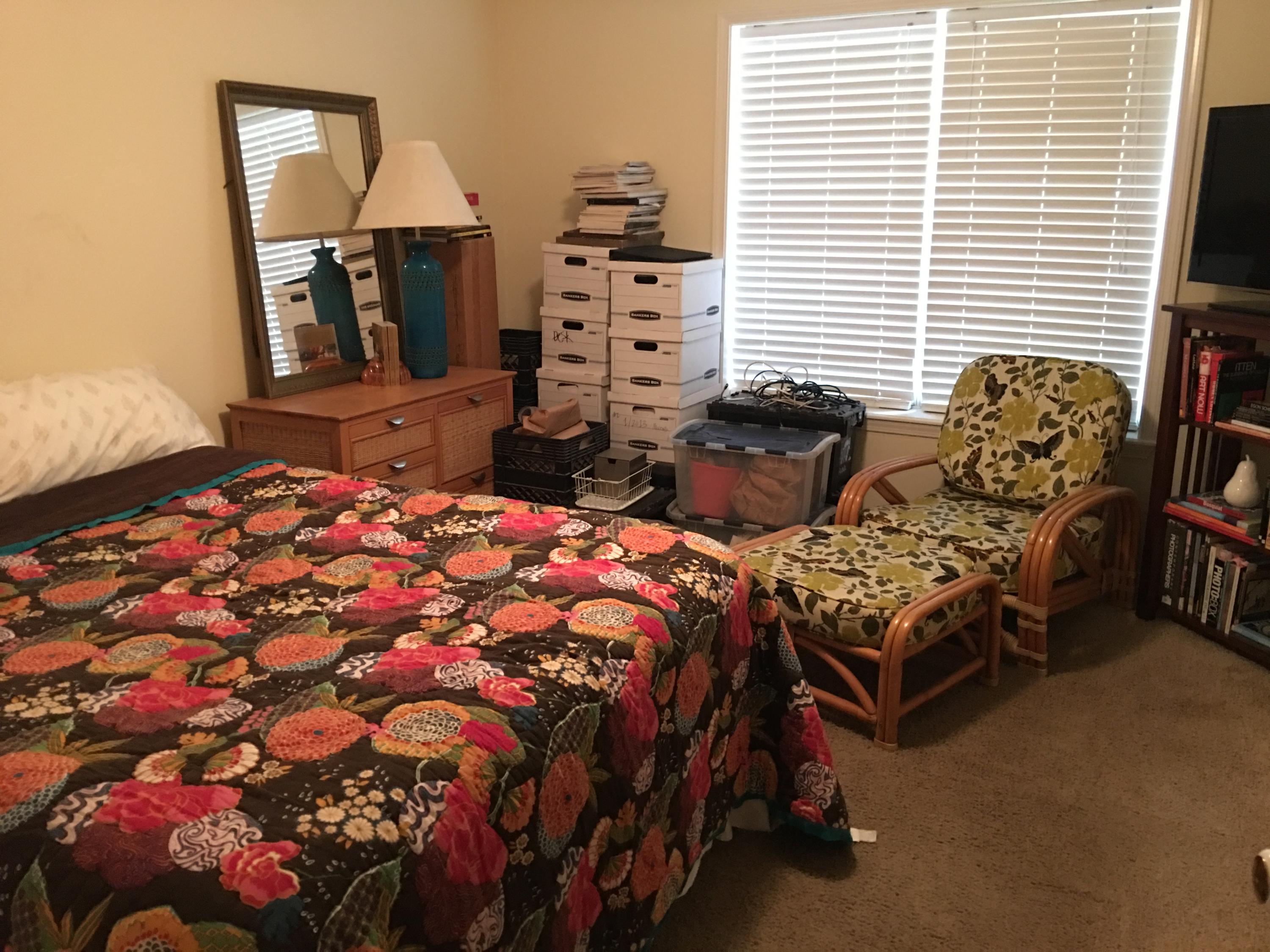 274 North Bishop Road Santa Rosa Beach, FL 32459 - Photo 5 of 17 a bed sitting in a bedroom next to a window