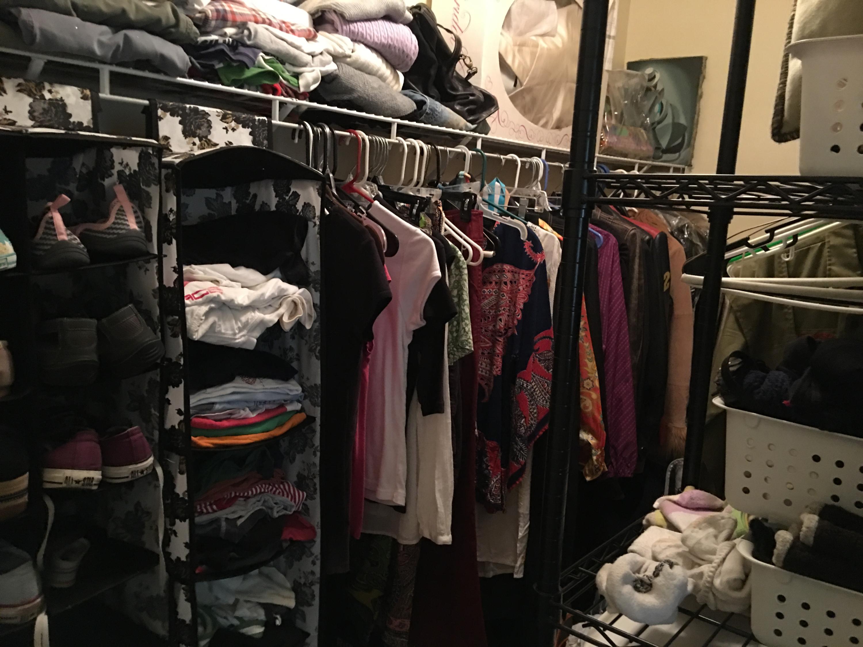 274 North Bishop Road Santa Rosa Beach, FL 32459 - Photo 7 of 17 a view of walk in closet with clothes and shoes