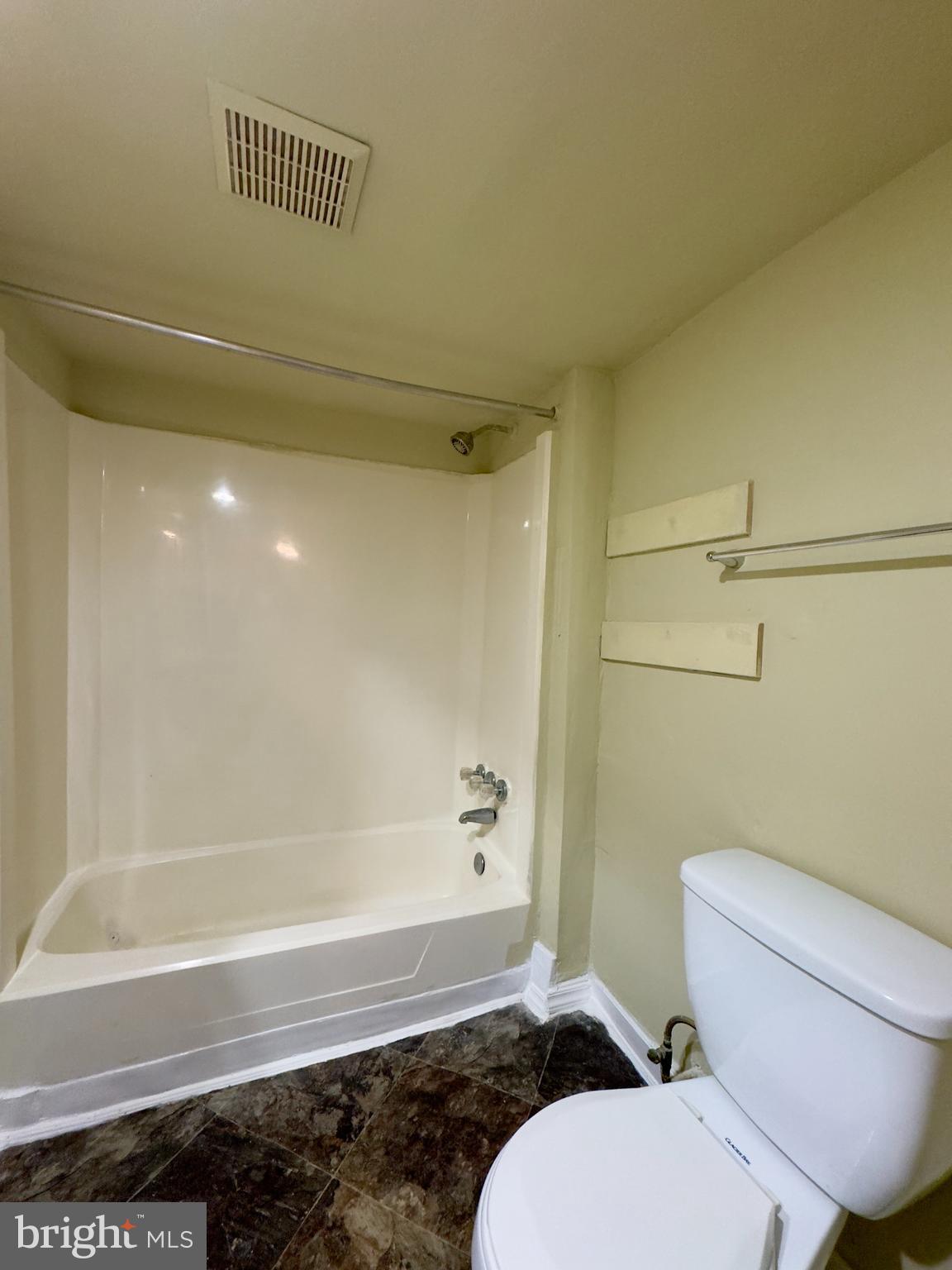 1503 Eutaw Place, Unit B1 Baltimore, MD 21217 - Photo 5 of 7 a bathroom with a toilet and a shower