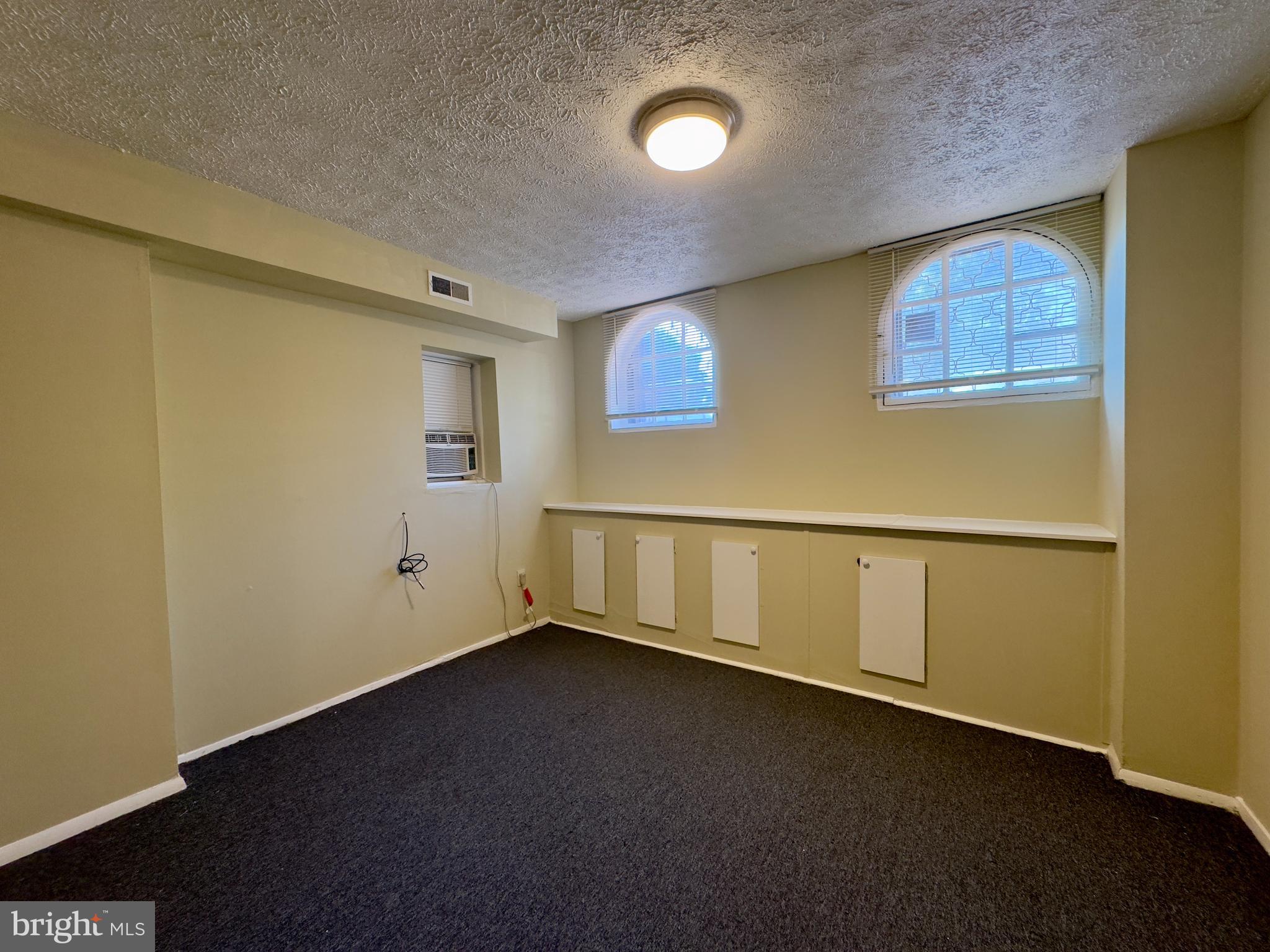 1503 Eutaw Place, Unit B1 Baltimore, MD 21217 - Photo 6 of 7 a view of an empty room