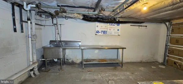 a view of storage and utility room