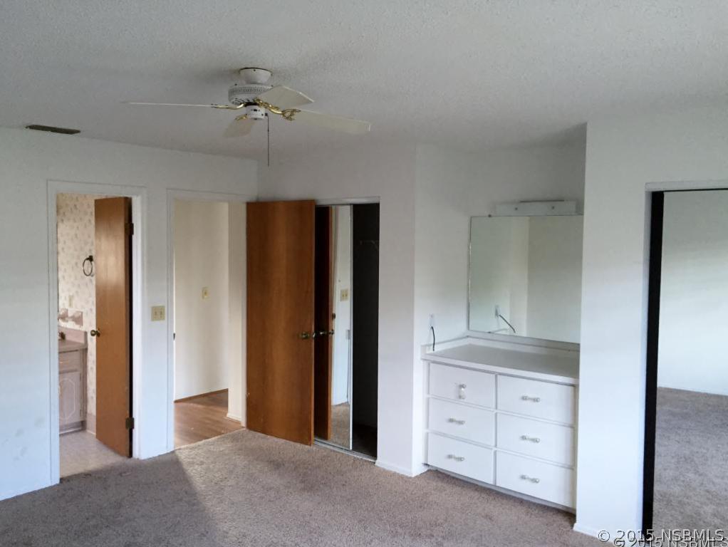 509 Cardinal Drive Edgewater, FL 32141 - Photo 7 of 10 a view of an empty room