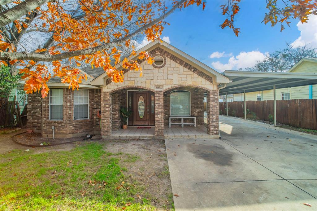 3934 Harlingen Street Dallas, TX 75212 - Photo 21 of 26 a view of a house with backyard porch and sitting area