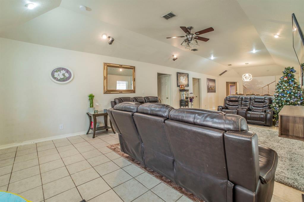 3934 Harlingen Street Dallas, TX 75212 - Photo 3 of 26 a living room with furniture and a ceiling fan