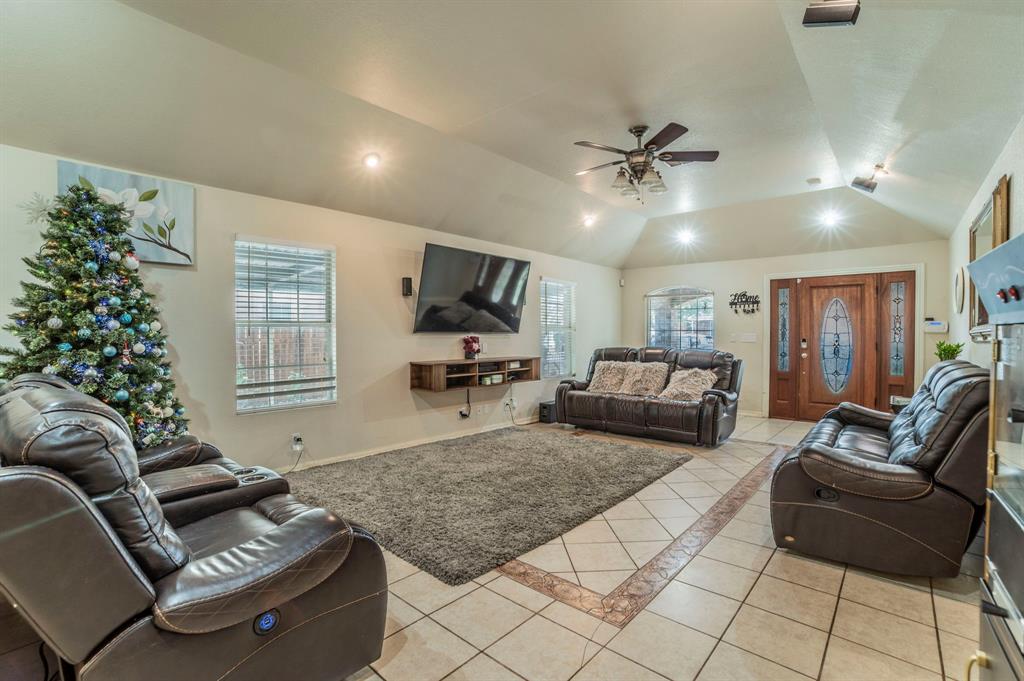 3934 Harlingen Street Dallas, TX 75212 - Photo 6 of 26 a living room with furniture and a flat screen tv