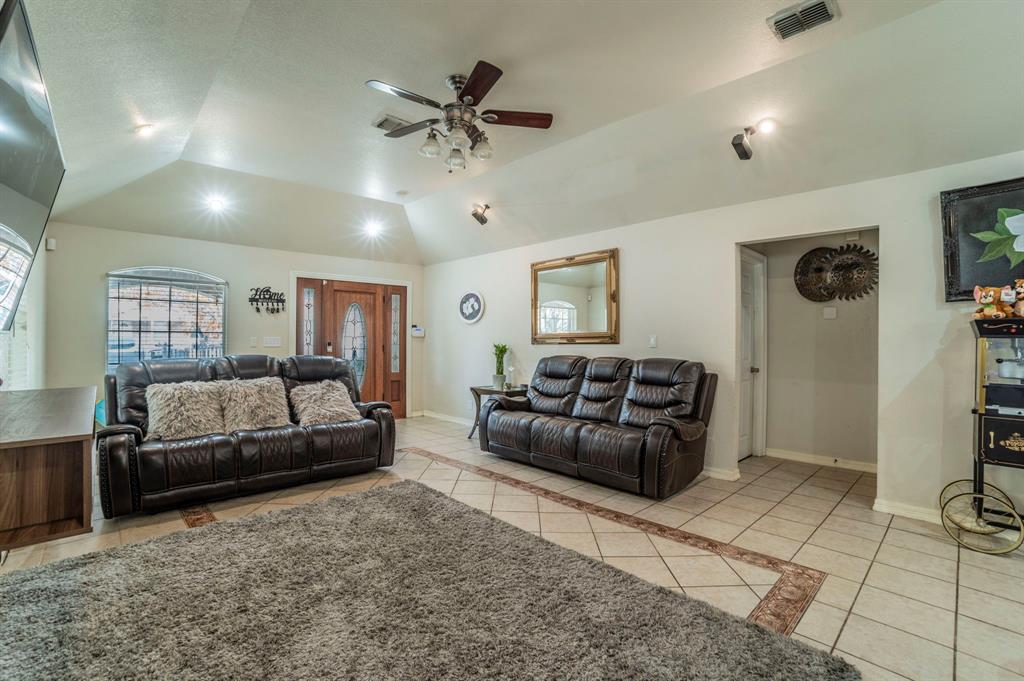 3934 Harlingen Street Dallas, TX 75212 - Photo 7 of 26 a living room with furniture and a couch