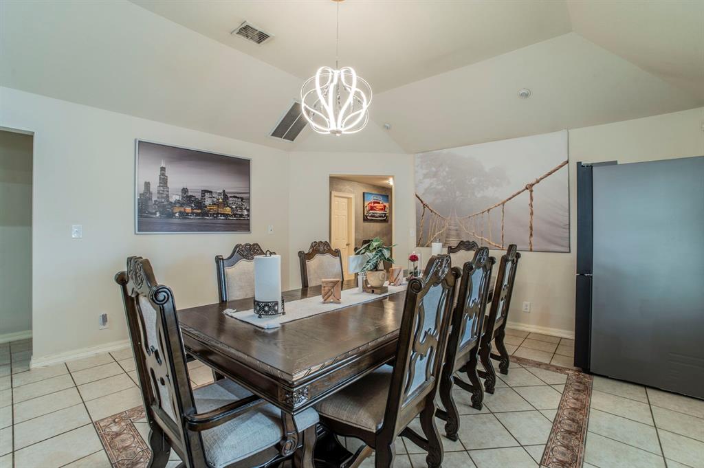 3934 Harlingen Street Dallas, TX 75212 - Photo 10 of 26 a view of a dining room with furniture