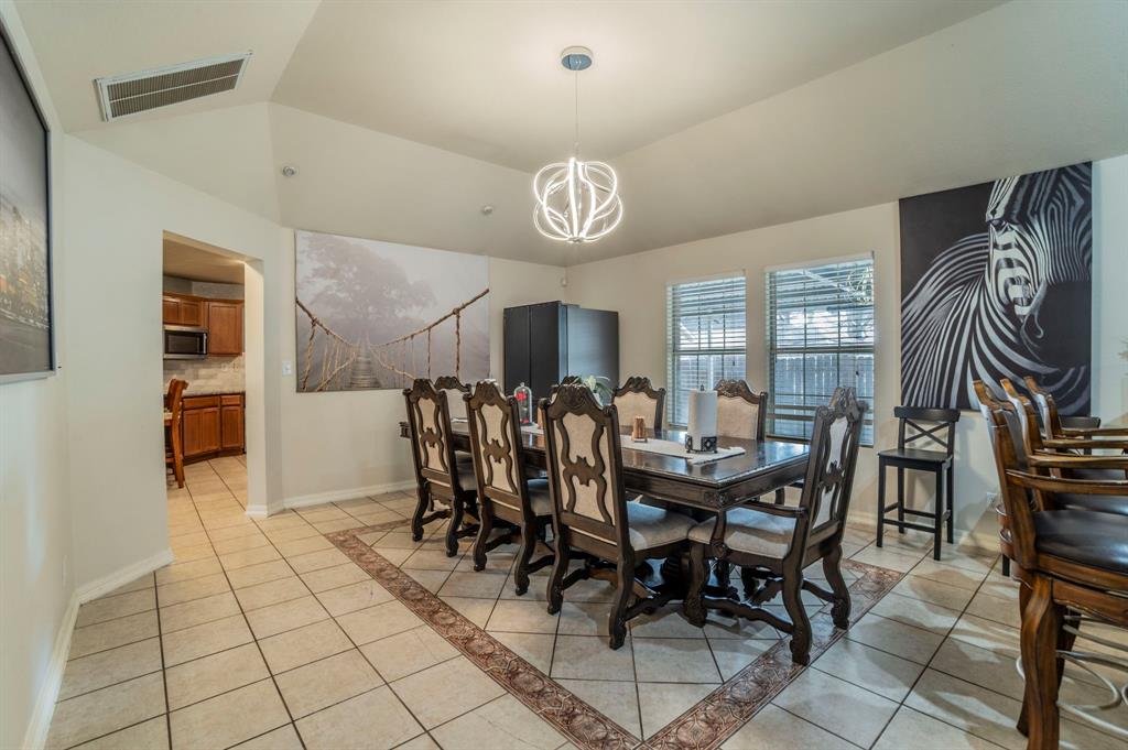 3934 Harlingen Street Dallas, TX 75212 - Photo 10 of 26 a view of a dining room with furniture