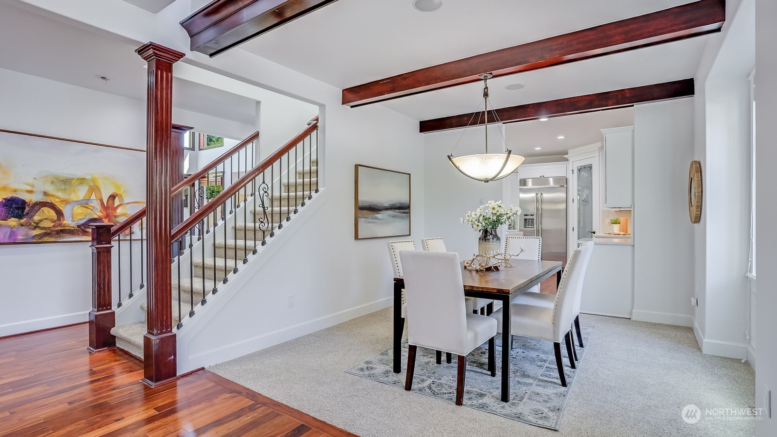 1152 Queen Avenue Northeast Renton, WA 98056 - Photo 11 of 40 a view of a dining room with furniture and wooden floor