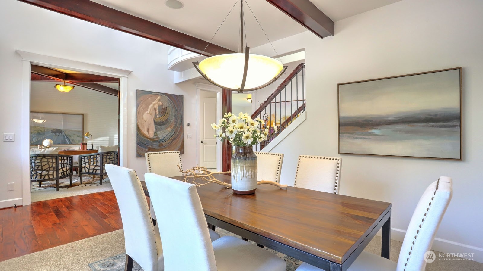 1152 Queen Avenue Northeast Renton, WA 98056 - Photo 12 of 40 a view of a dining room with furniture and wooden floor