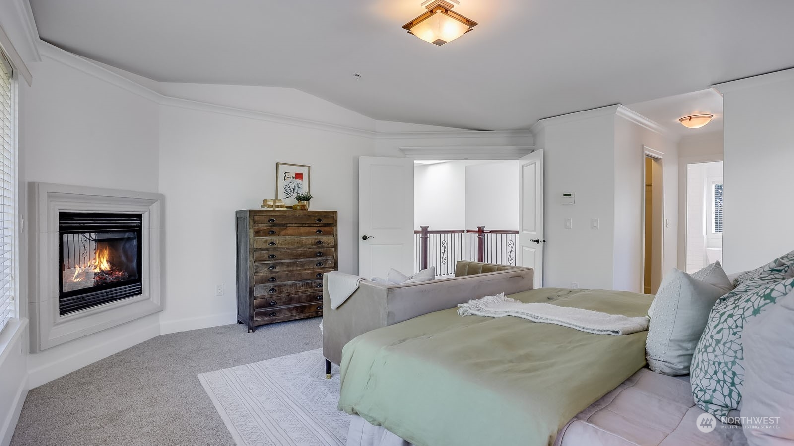 1152 Queen Avenue Northeast Renton, WA 98056 - Photo 24 of 40 a bedroom with a bed and a television