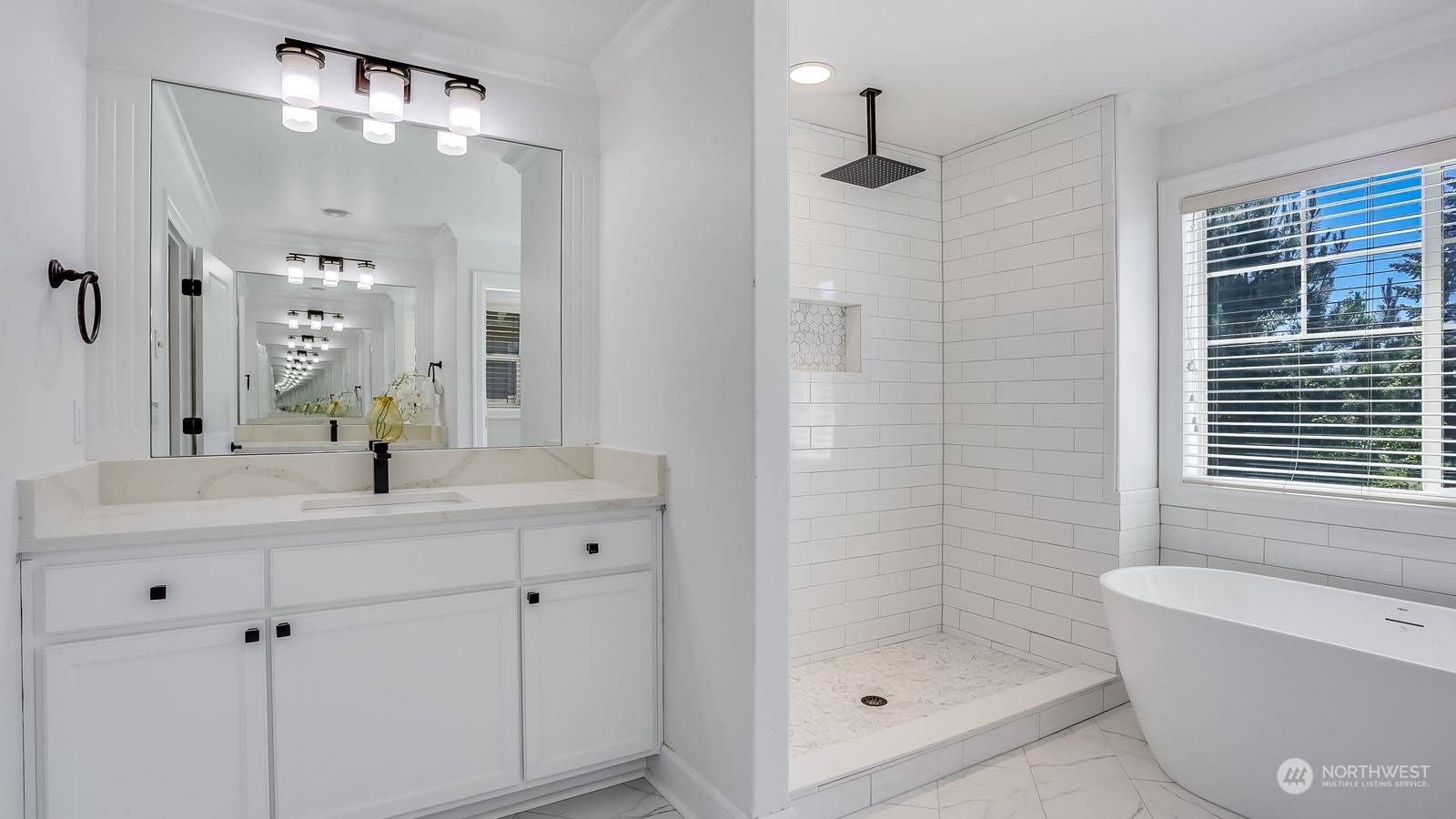 1152 Queen Avenue Northeast Renton, WA 98056 - Photo 25 of 40 a bathroom with a double vanity sink mirror and shower