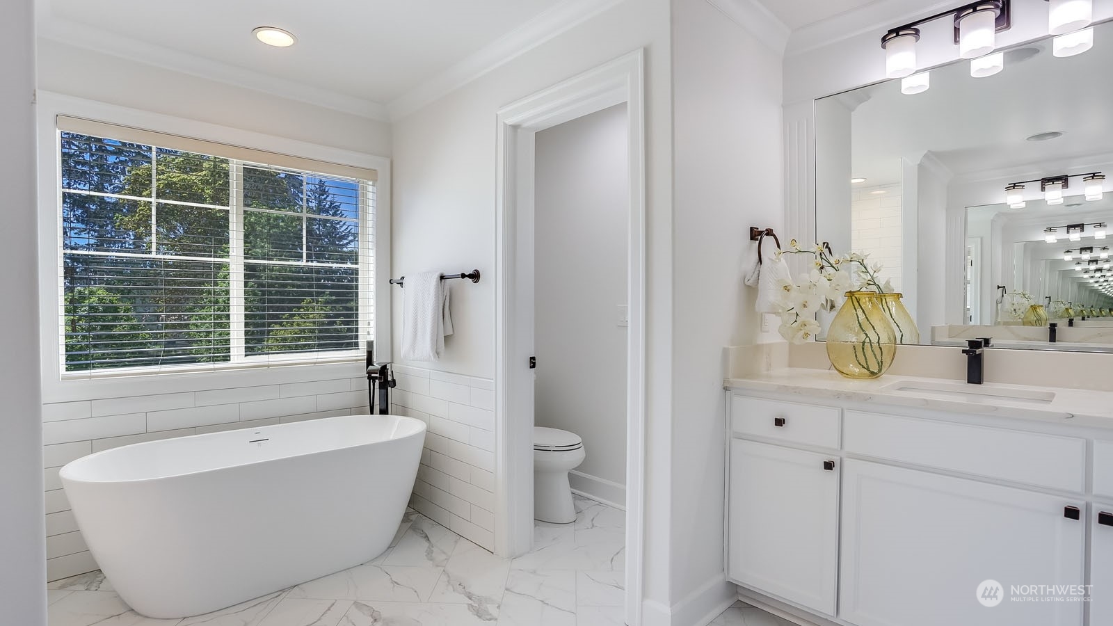 1152 Queen Avenue Northeast Renton, WA 98056 - Photo 27 of 40 a bathroom with a bathtub and a sink