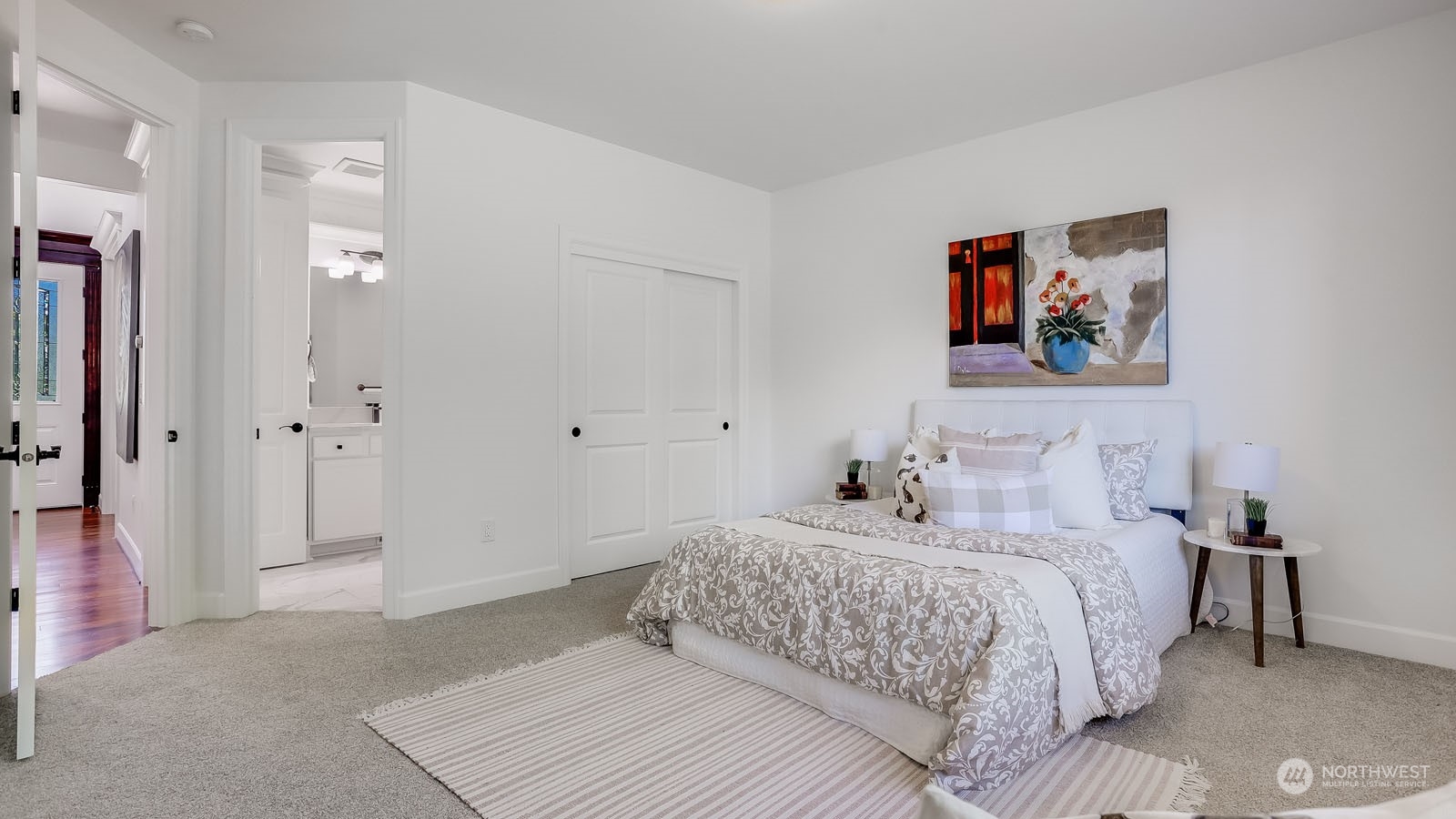 1152 Queen Avenue Northeast Renton, WA 98056 - Photo 29 of 40 a bedroom with a bed and a painting on the wall