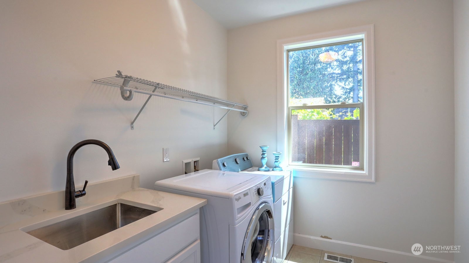 1152 Queen Avenue Northeast Renton, WA 98056 - Photo 31 of 40 a utility room with dryer and washer