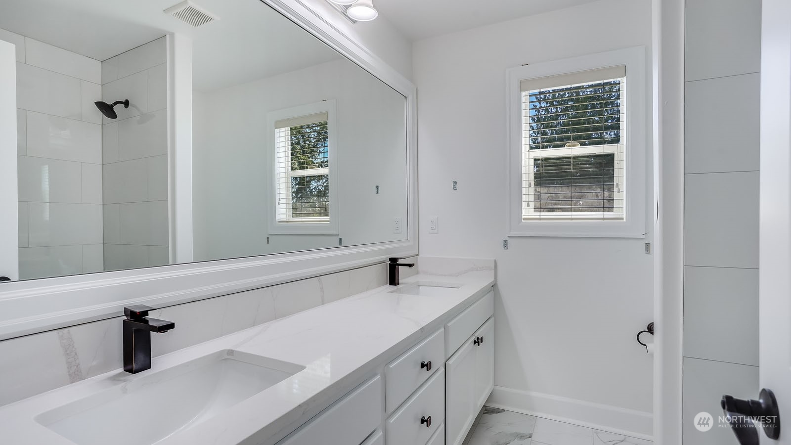1152 Queen Avenue Northeast Renton, WA 98056 - Photo 33 of 40 a bathroom with a sink and a window