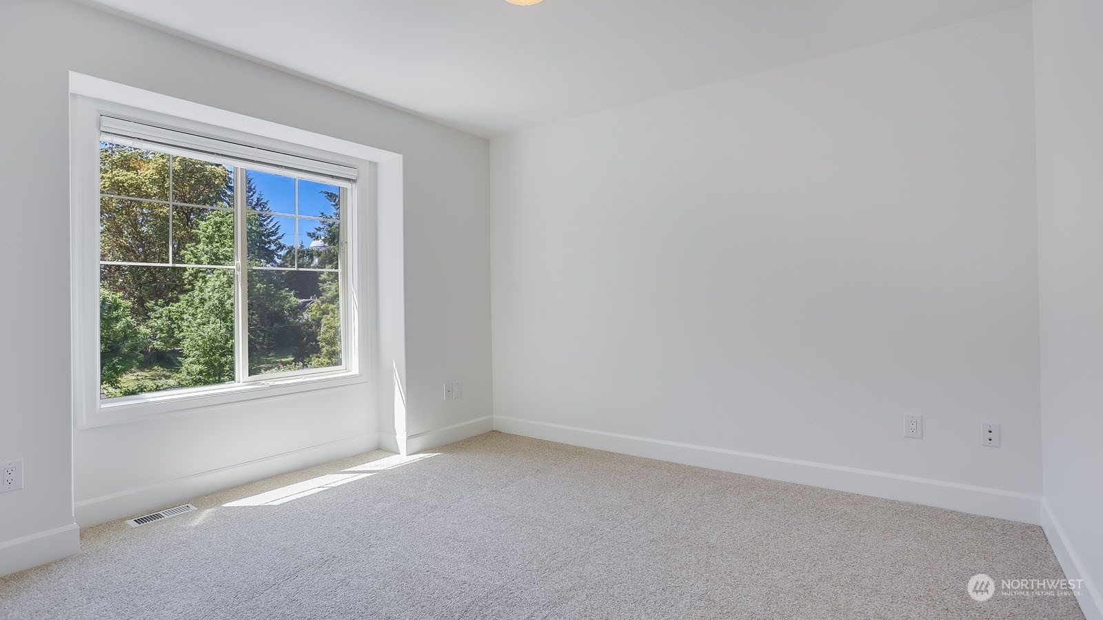 1152 Queen Avenue Northeast Renton, WA 98056 - Photo 35 of 40 an empty room with a window
