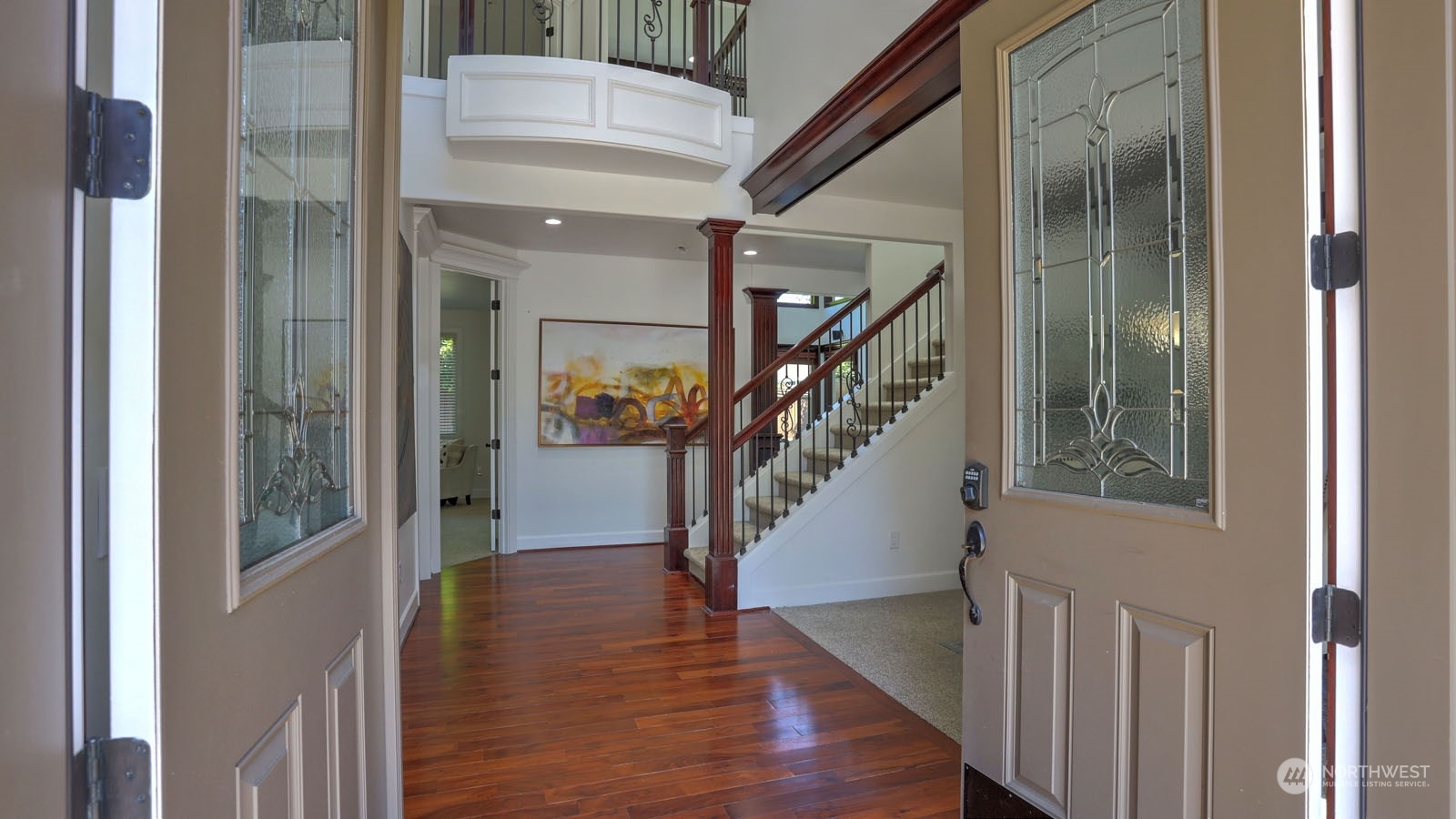 1152 Queen Avenue Northeast Renton, WA 98056 - Photo 5 of 40 a view of entryway and hall with wooden floor