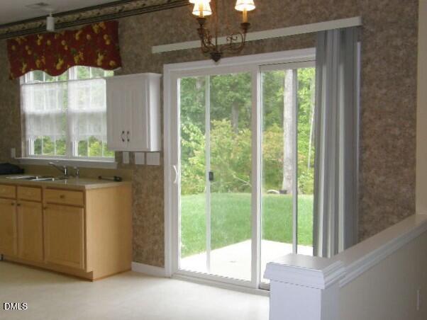 102 Willingham Road Morrisville, NC 27560 - Photo 7 of 19 a kitchen with a window and a sink
