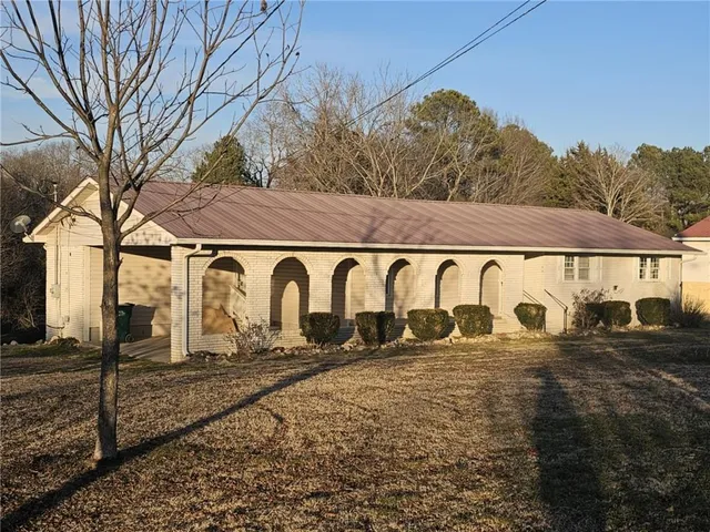 a street sign that is on the side of the road