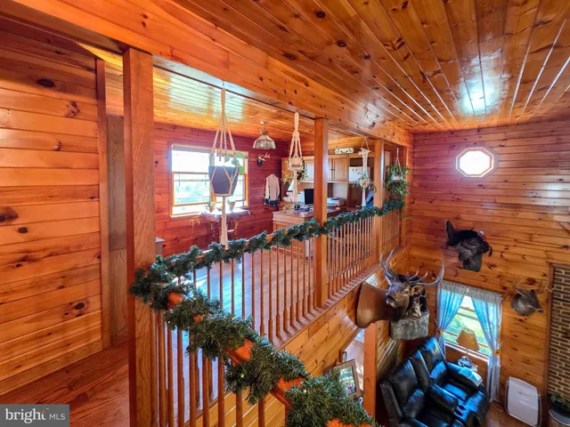 a view of a living room and hardwood floor