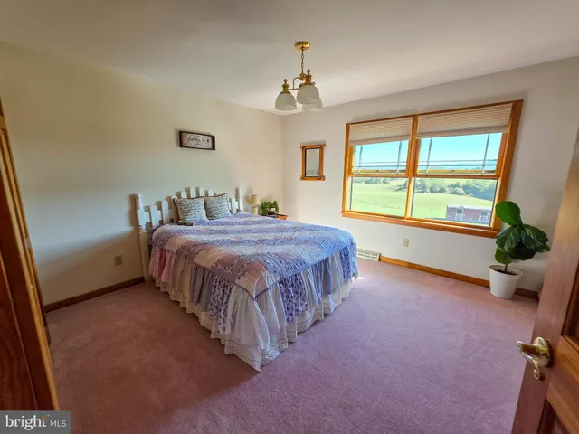 a utility room with fridge dryer and washer