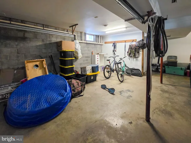 a view of a backyard with sitting area