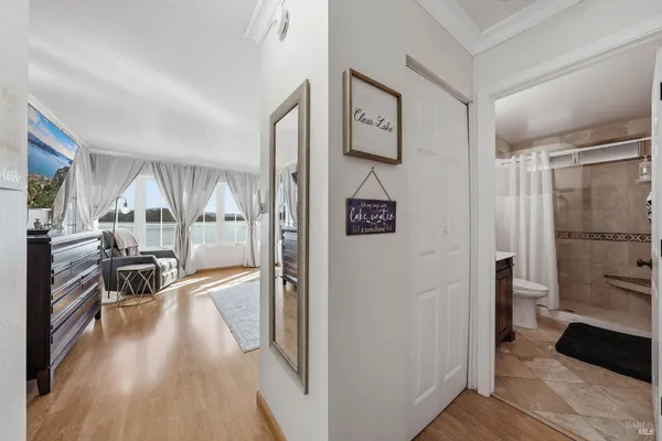 a view of a chairs and table on the balcony