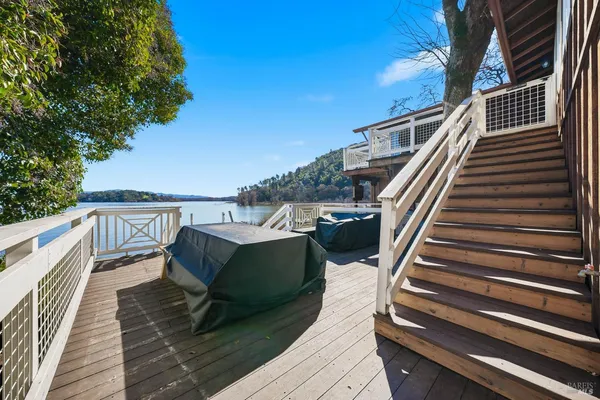 a view of a backyard of the house