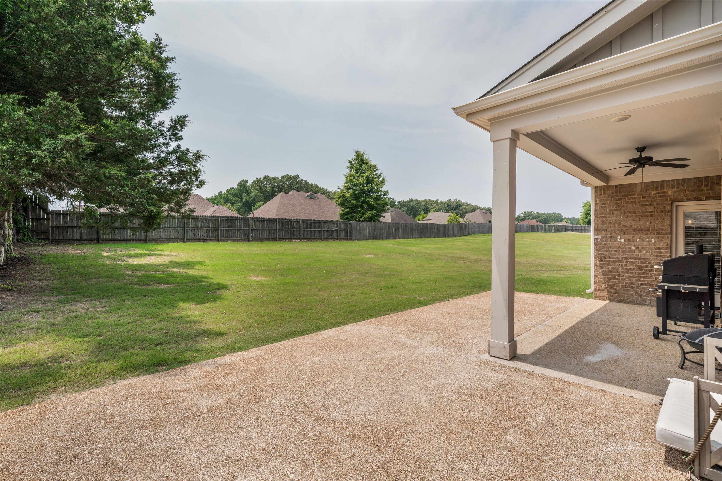 7689 Elpine Gray Drive Bartlett, TN 38002 - Photo 14 of 14 a view of a garden with an outdoor space