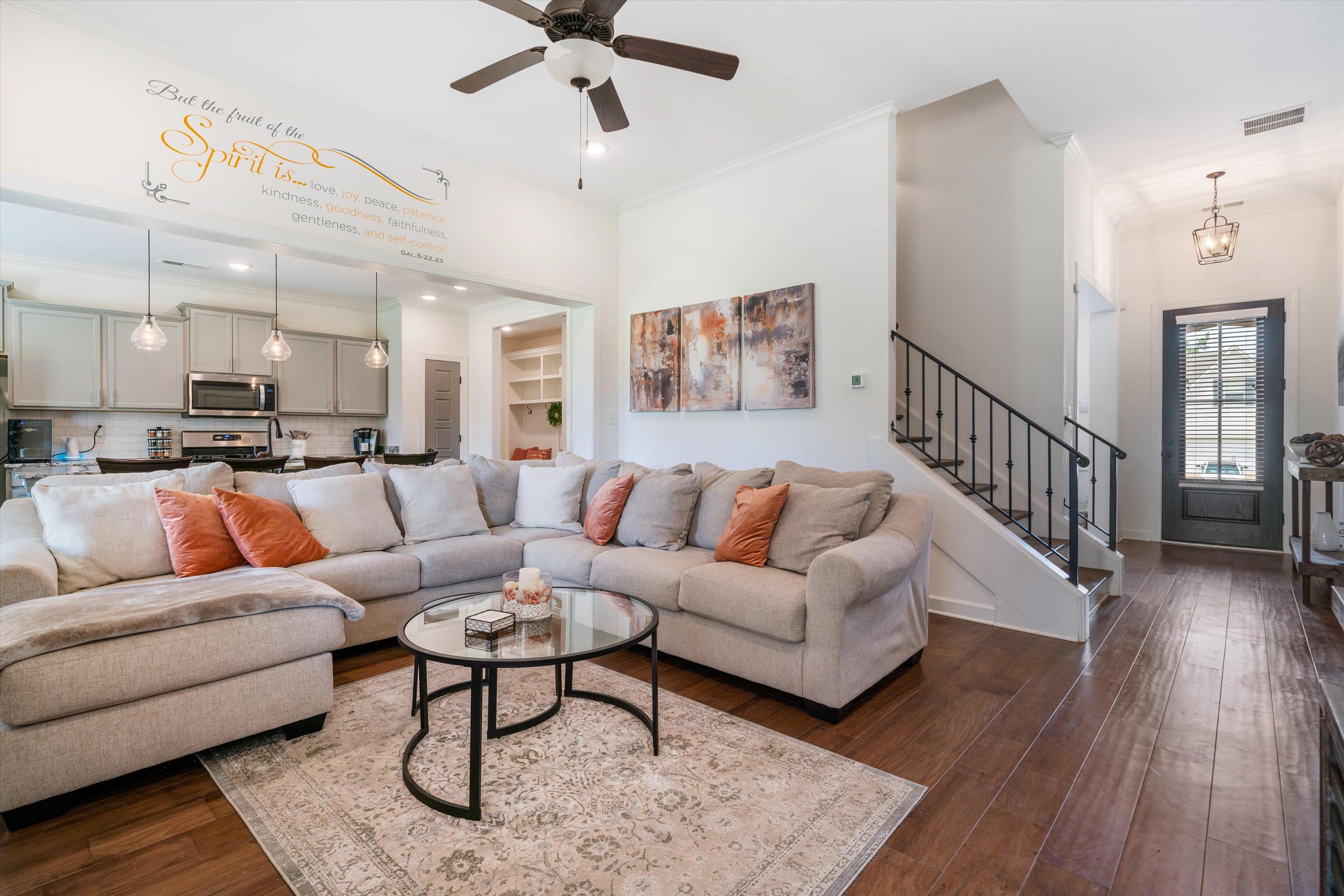 7689 Elpine Gray Drive Bartlett, TN 38002 - Photo 5 of 14 a living room with furniture or kitchen view and a wooden floor
