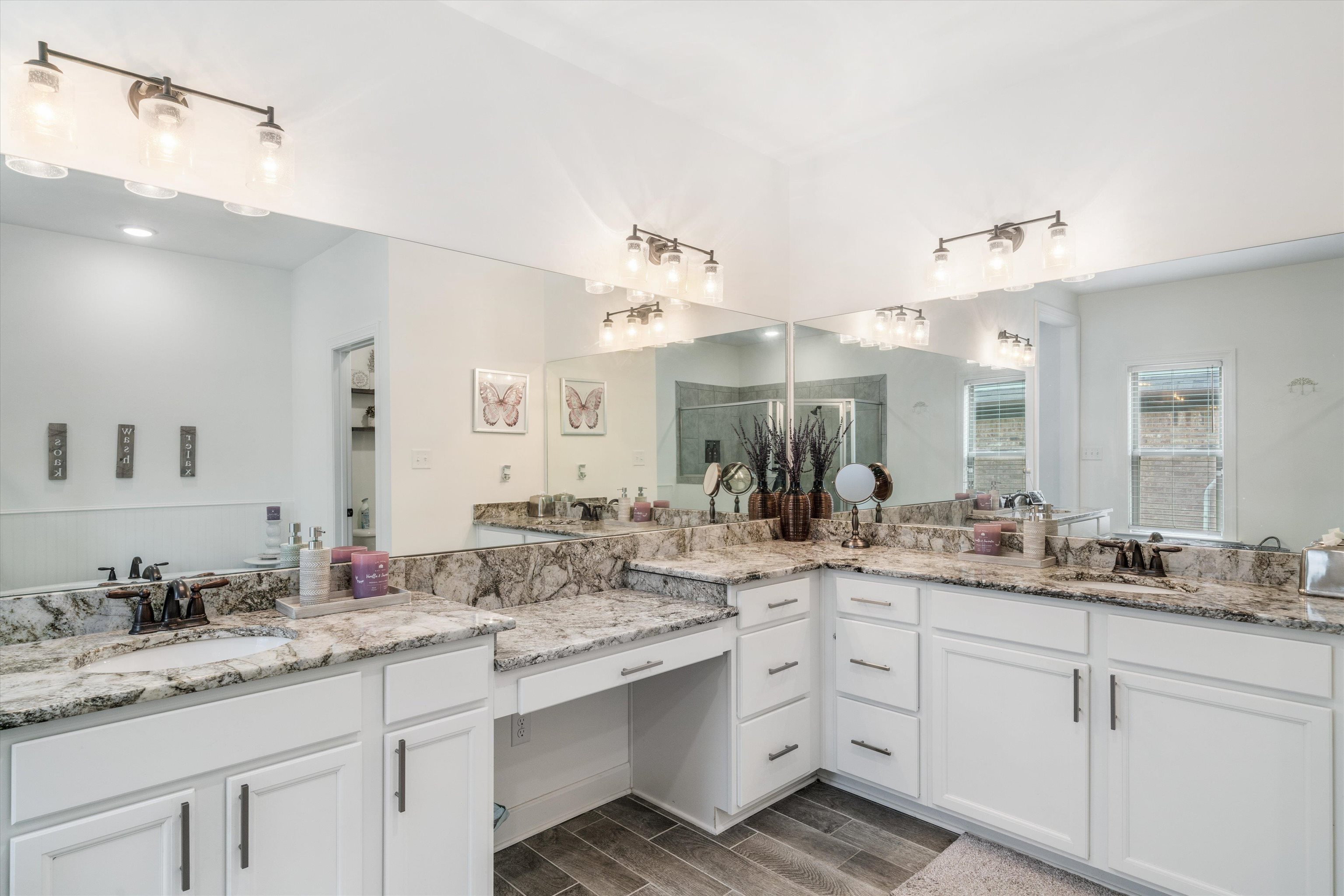 7689 Elpine Gray Drive Bartlett, TN 38002 - Photo 10 of 14 a bathroom with a granite countertop sink mirror and double