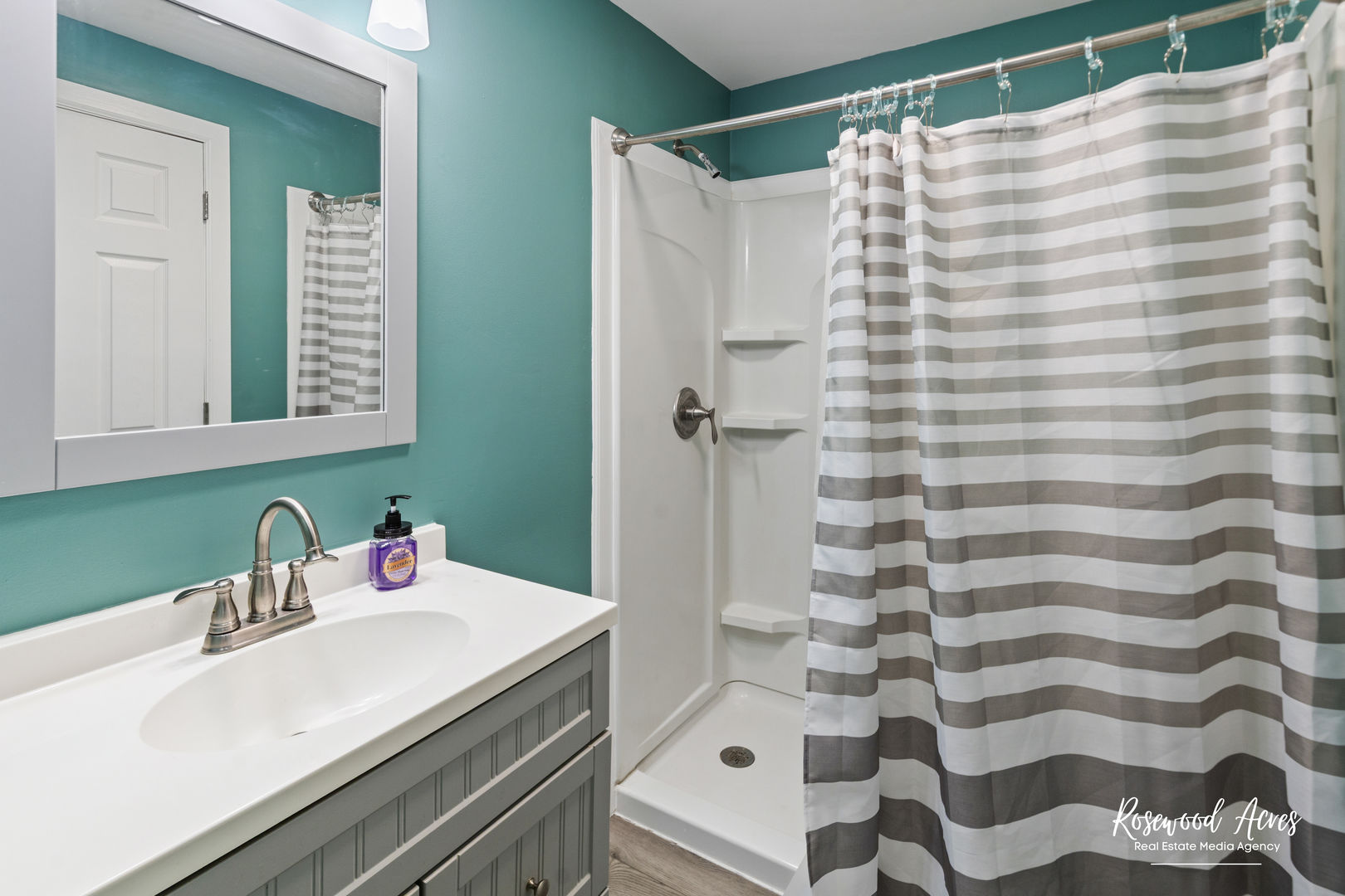 502 East 3rd Street Herscher, IL 60941 - Photo 9 of 15 a bathroom with a sink and mirror