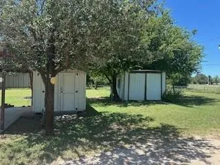 a house with trees in the background
