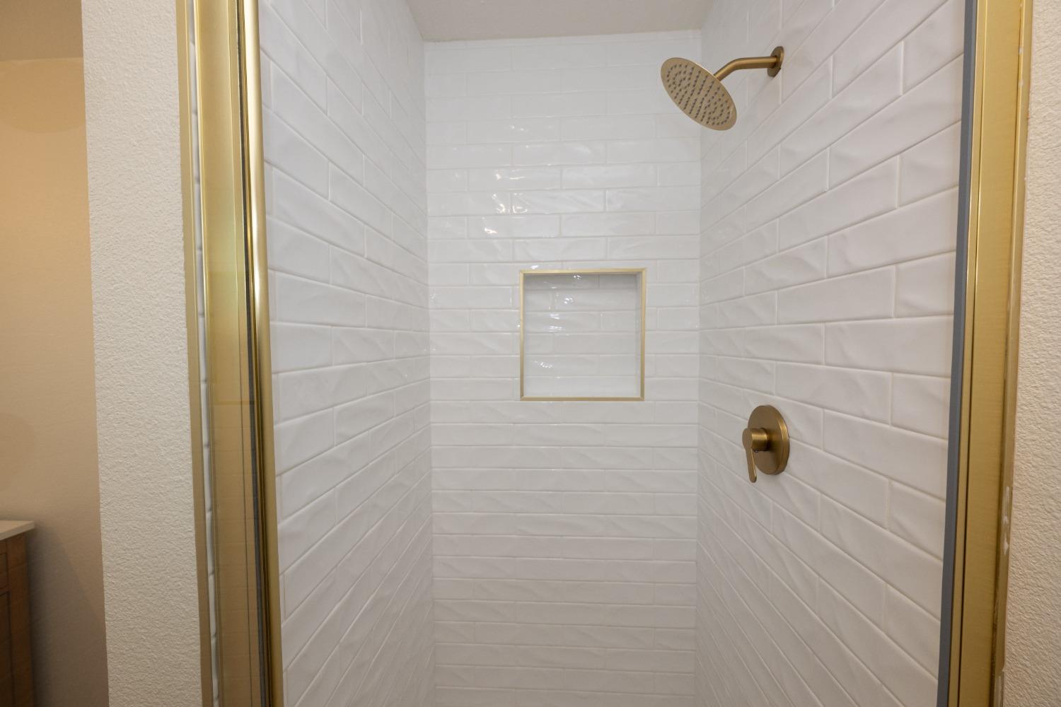 41175 Grove Circle Madera, CA 93636 - Photo 29 of 39 a bathroom with a shower