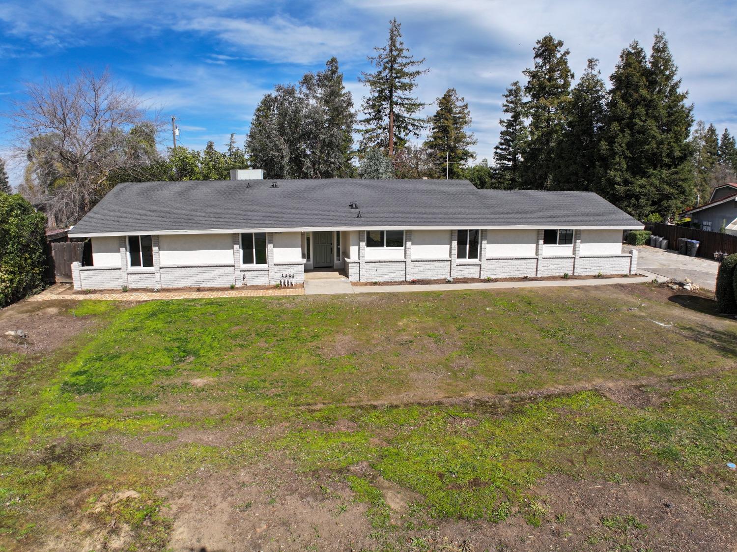 41175 Grove Circle Madera, CA 93636 - Photo 38 of 39 a view of house with garden space and street view