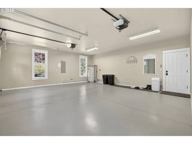 a view of an empty room with windows