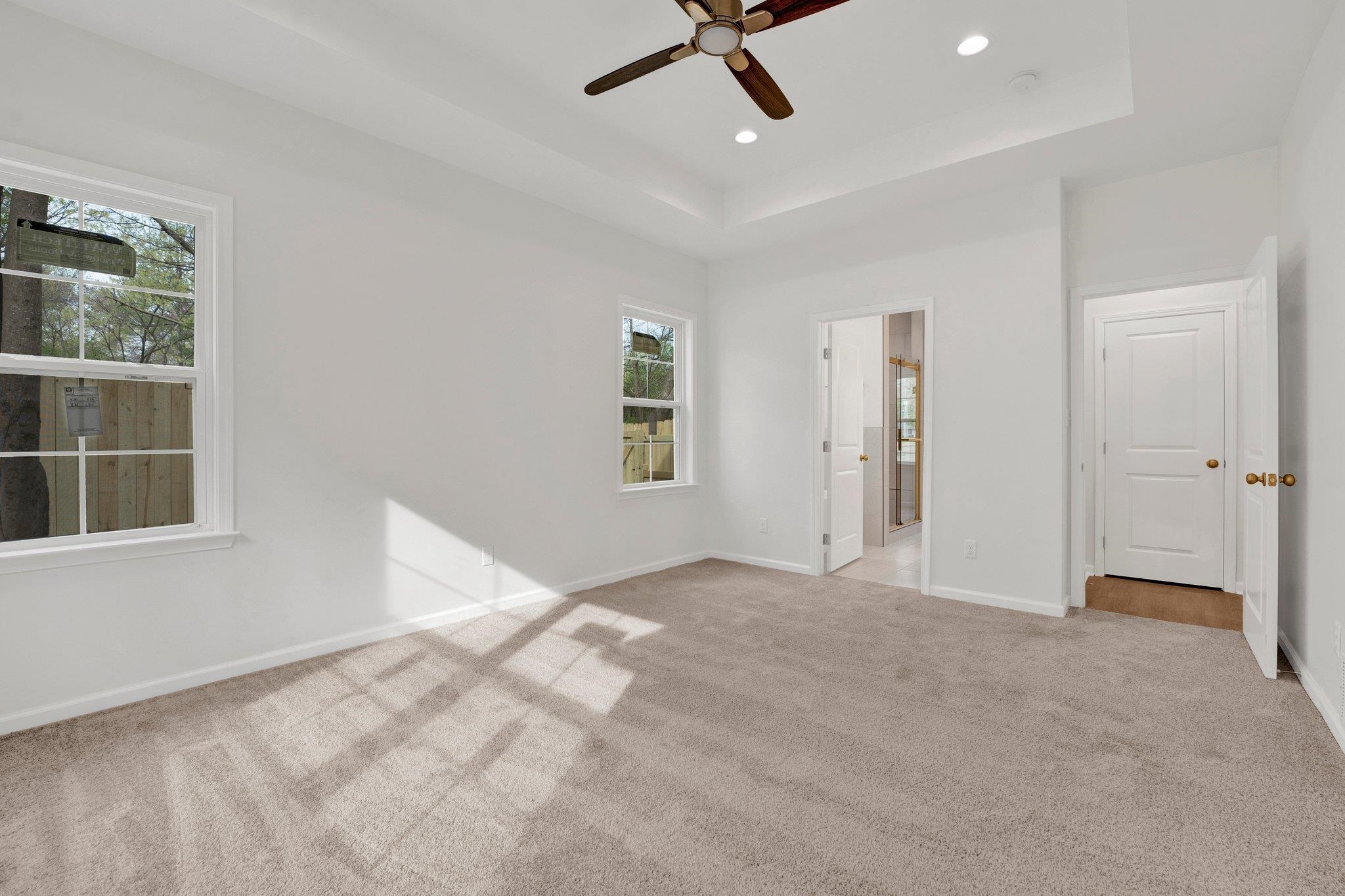 4056 Fonta Road Bartlett, TN 38002 - Photo 20 of 39 Unfurnished bedroom with baseboards, carpet floors, a tray ceiling, and recessed lighting