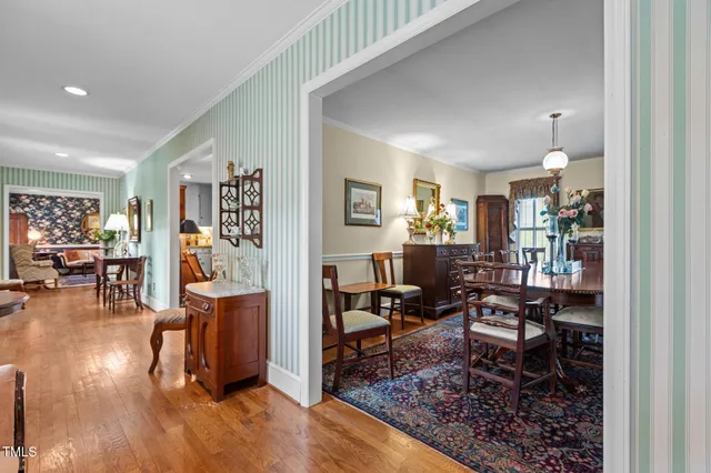 a bathroom with a sink toilet and a mirror