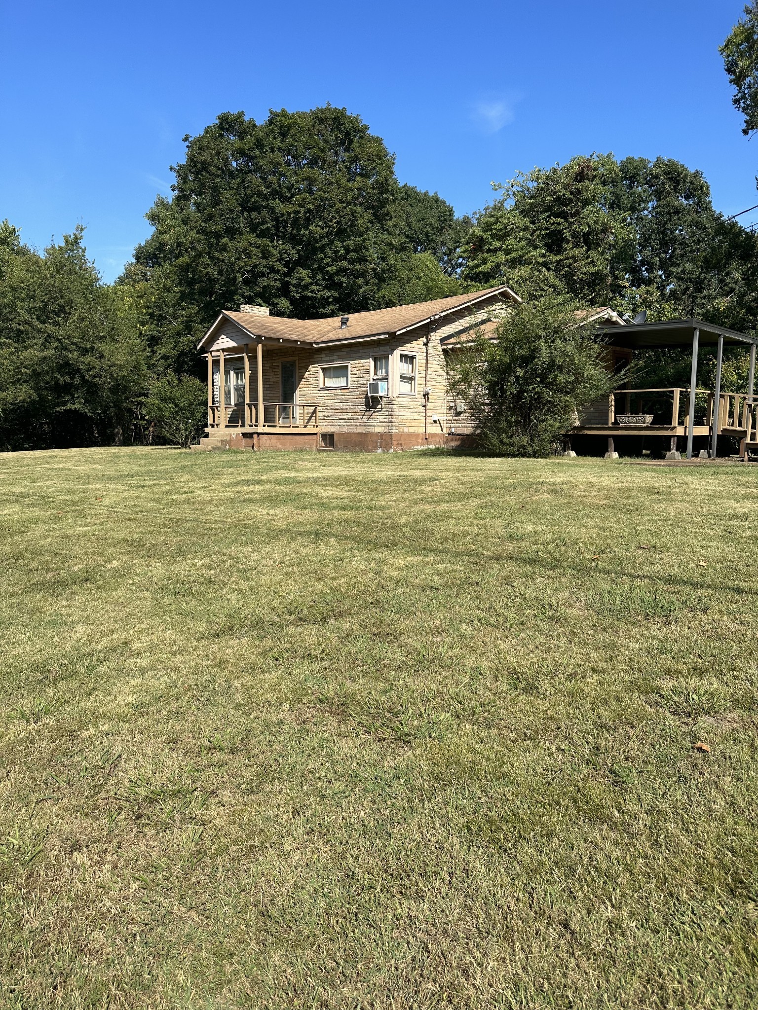 340 John Wright Road Mount Juliet, TN 37122 - Photo 7 of 11 a front view of a house with a garden