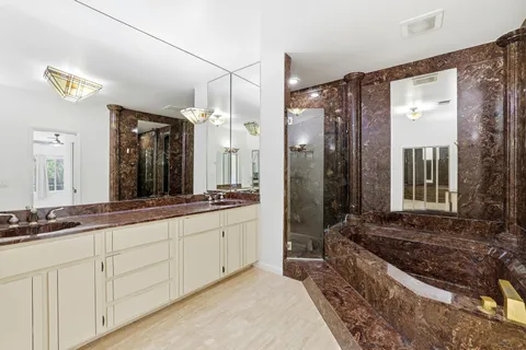 a bedroom with a bed and a table