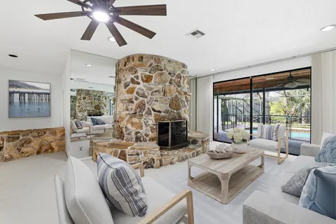 a living room with fireplace