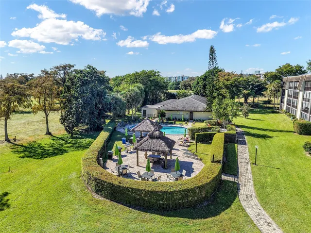 a view of a swimming pool with a patio