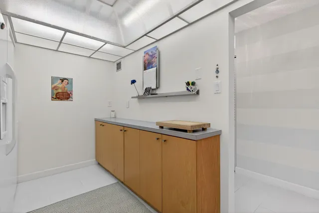 a view of cabinets and wooden floor
